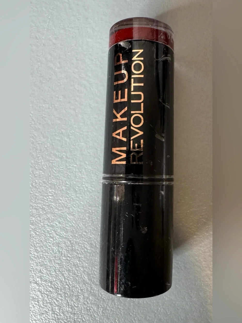 Makeup Revolution Lipstick in reckless Deep Red Shade burgundy